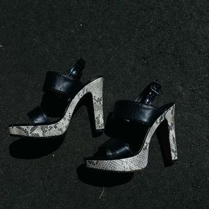 Black snake skin platform shoes